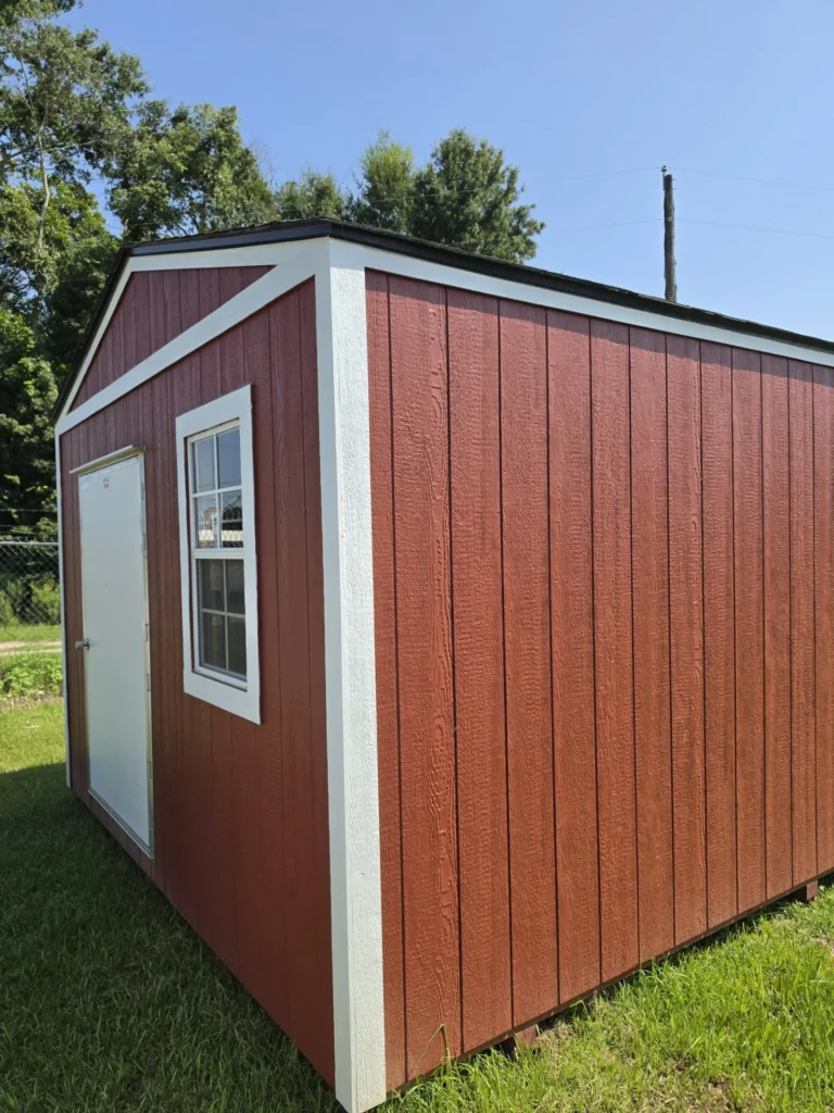 10X12 Shed with Barn Red siding and White trim and a roof
