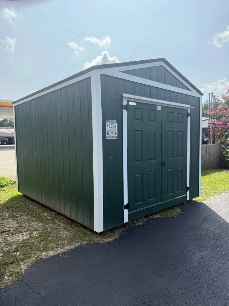 10X12 Shed with Hunter Green siding and White trim and a roof