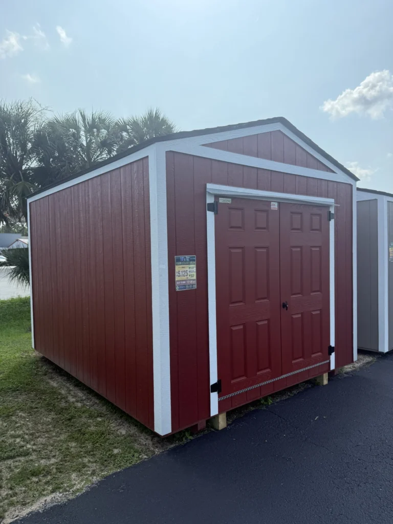 10X12 Shed with Barn Red siding and White trim and a roof