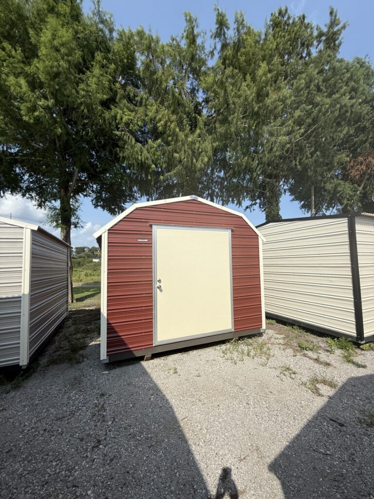 10x12 Shed with Rustic Red siding and Colonial White trim and a Barn roof
