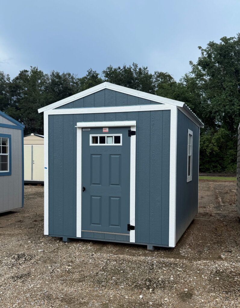 8X12 Shed with Slate Tile siding and White trim and a Americana roof
